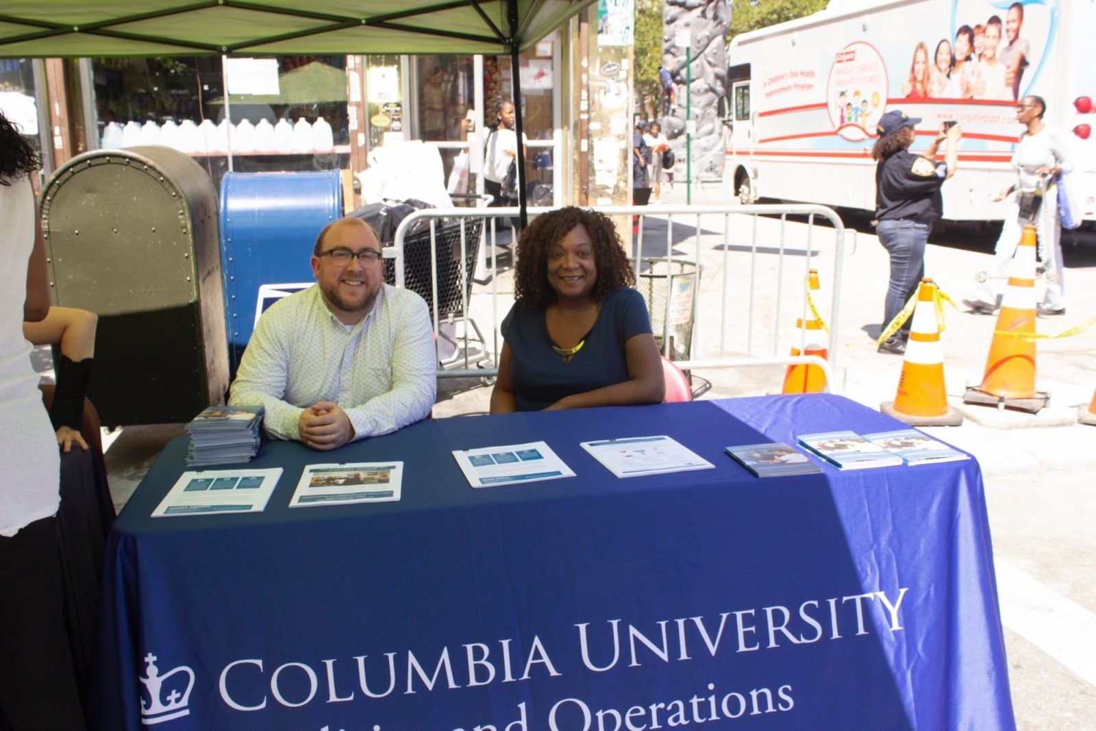 Facilities and Operations team members Analyst for Compliance & Reporting Matthew Simon, and Assistant Vice President for University Diversity & Program Integration Tanya Pope, share information about key University programs with the community. 