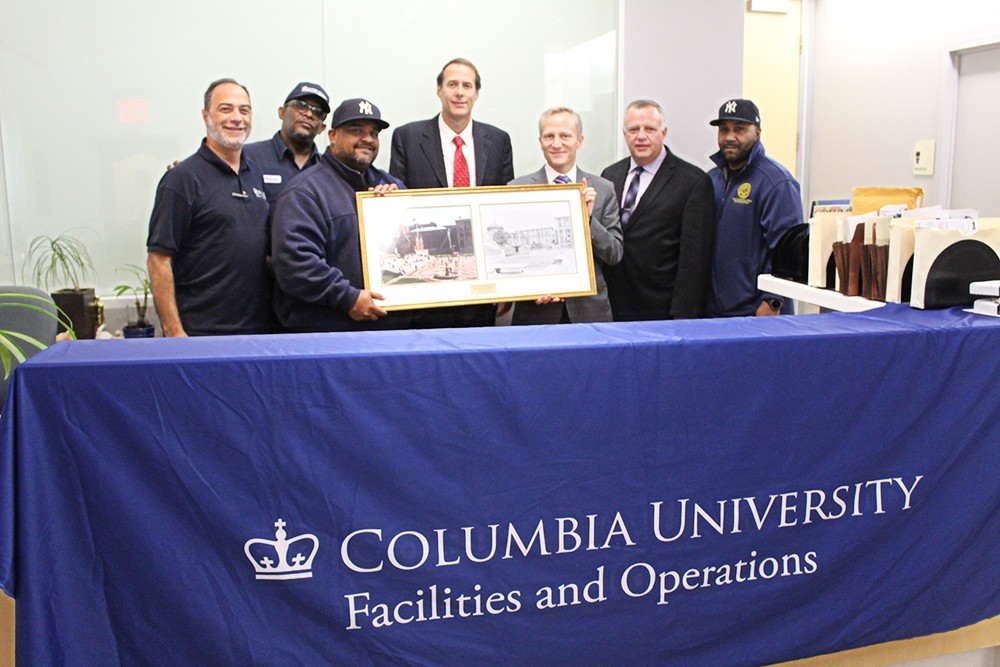 TWU Local 241 leadership received a framed photo and a letter signed from David M. Greenberg, executive vice president for University Facilities and Operations, to celebrate the union's 75th anniversary.