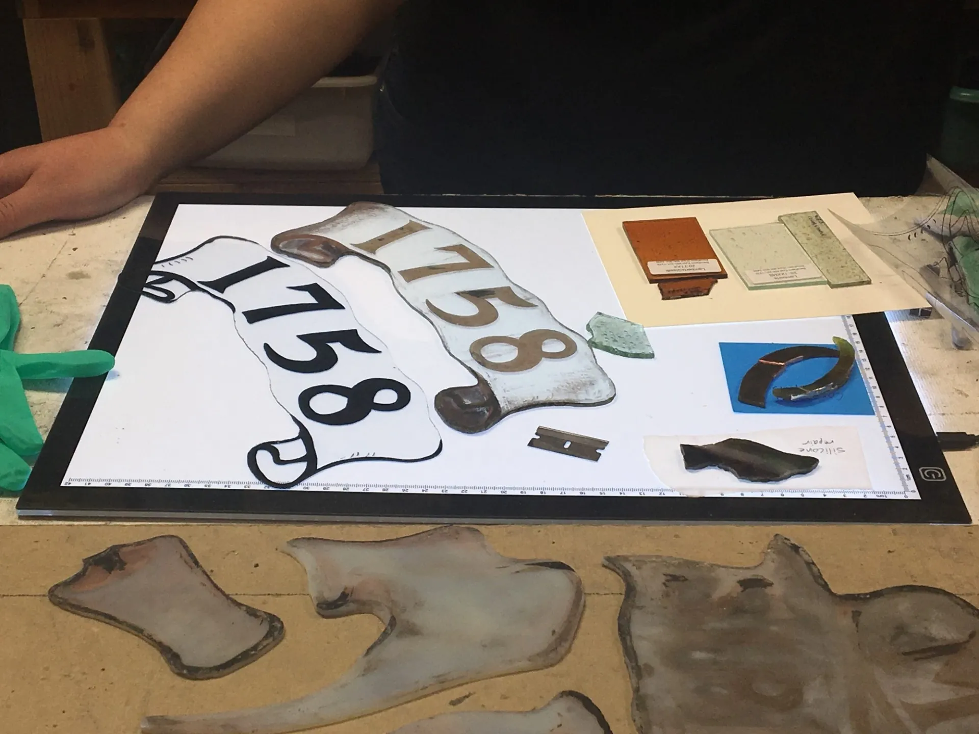 A portion of the stained glass windows being restored at a restoration studio