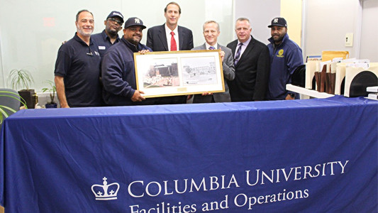 TWU Local 241 leadership received a framed photo and a letter signed from David M. Greenberg, executive vice president for University Facilities and Operations, to celebrate the union's 75th anniversary.